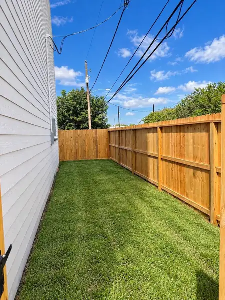Exterior details and patio area of a home in , Houston (Image 1). Exterior details and patio area of a home in , Houston (Image 1).