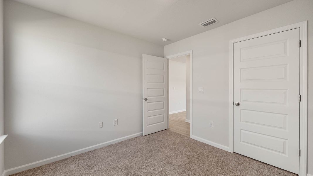 Spacious, unfurnished interior of a new home in Magnolia at the Bluffs Phase 3, Freeport (Image 18).