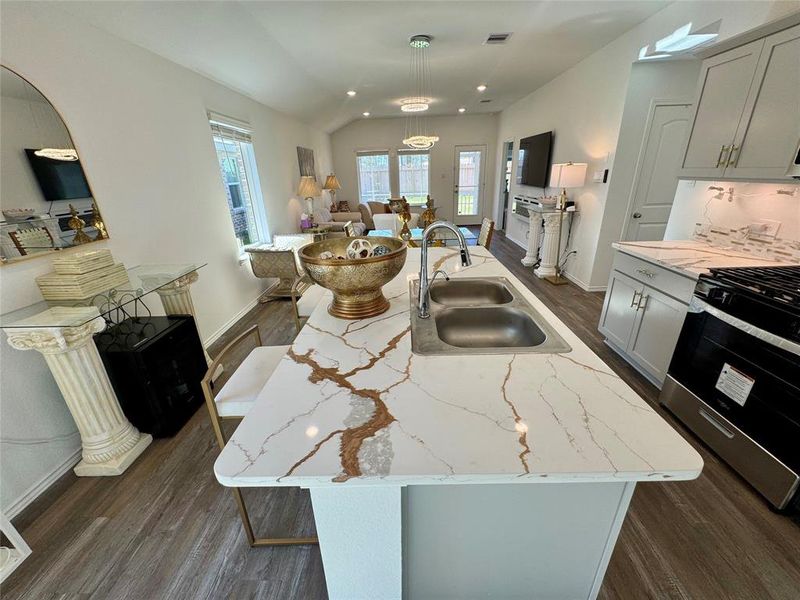 Bright kitchen with lots of natural light and under cebinet lighting