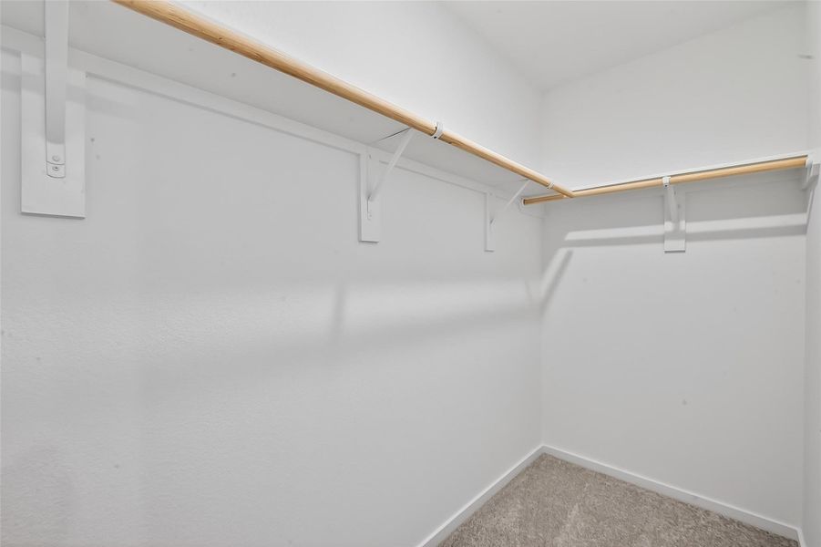 The primary features a large walk-in closer.