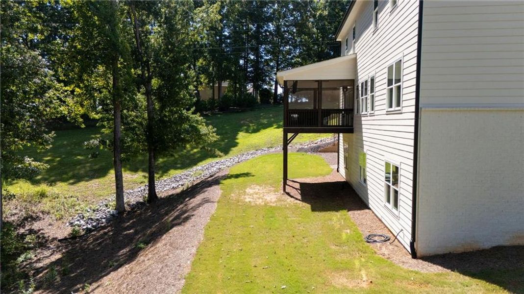 Exterior details and patio area of a home in , Hoschton (Image 45).