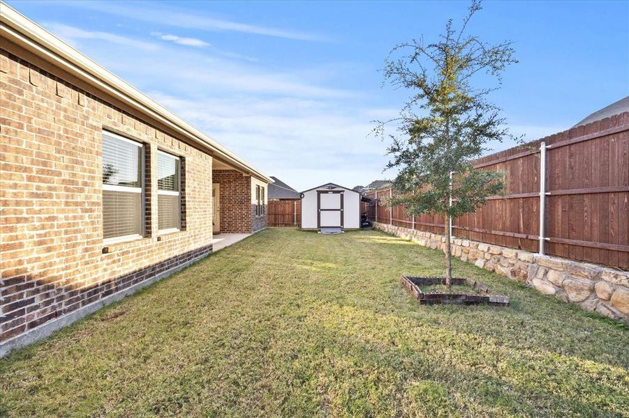 Exterior details and patio area of a home in Stonehaven, Caddo Mills (Image 3).