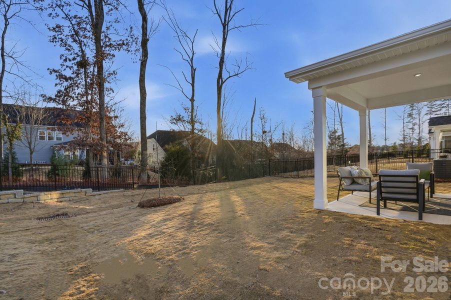 Exterior details and patio area of a home in Roseshire Chase, Huntersville (Image 3).