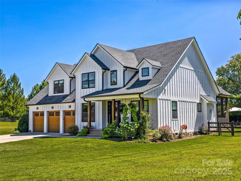 Front exterior of a new home in , Mills River, NC, highlighting curb appeal (Image 22).