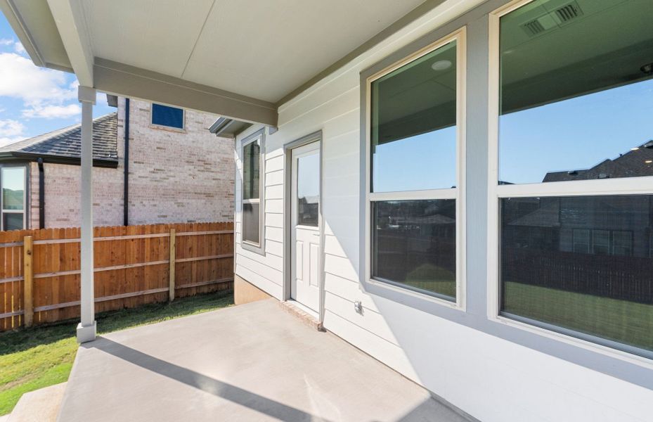 Exterior details and patio area of a home in Saddleback at Santa Rita Ranch, Liberty Hill (Image 31). Exterior details and patio area of a home in Saddleback at Santa Rita Ranch, Liberty Hill (Image 31).
