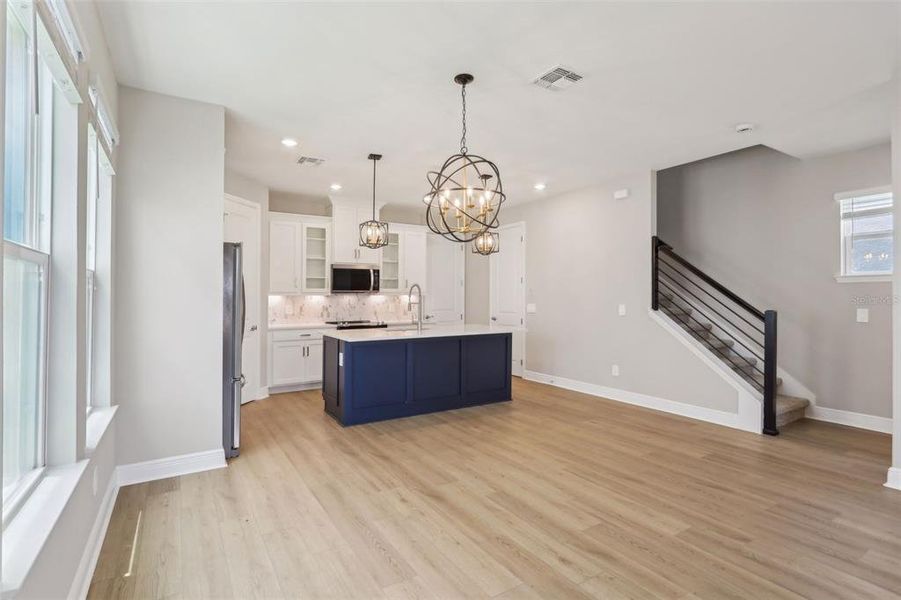 Furnished interior view inside a new home in Silverleaf Reserve Bungalows, Winter Garden (Image 10).