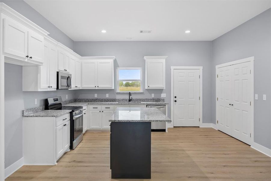 Furnished interior view inside a new home in , Ennis (Image 12).