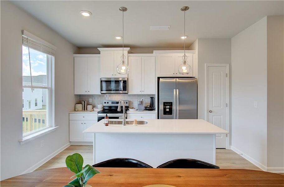 Furnished interior view inside a new home in Enclave at Evergreen, Fairburn (Image 11).