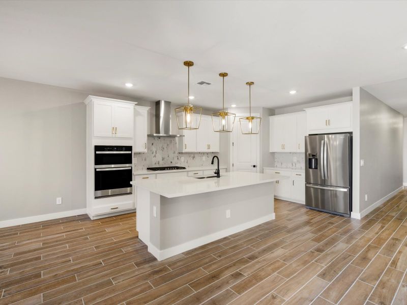 Furnished interior view inside a new home in Blossom Rock Reserve Series, Apache Junction (Image 1). Furnished interior view inside a new home in Blossom Rock Reserve Series, Apache Junction (Image 1).