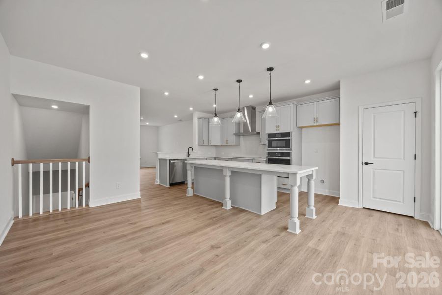 Furnished interior view inside a new home in River District Townhomes, Charlotte (Image 5).