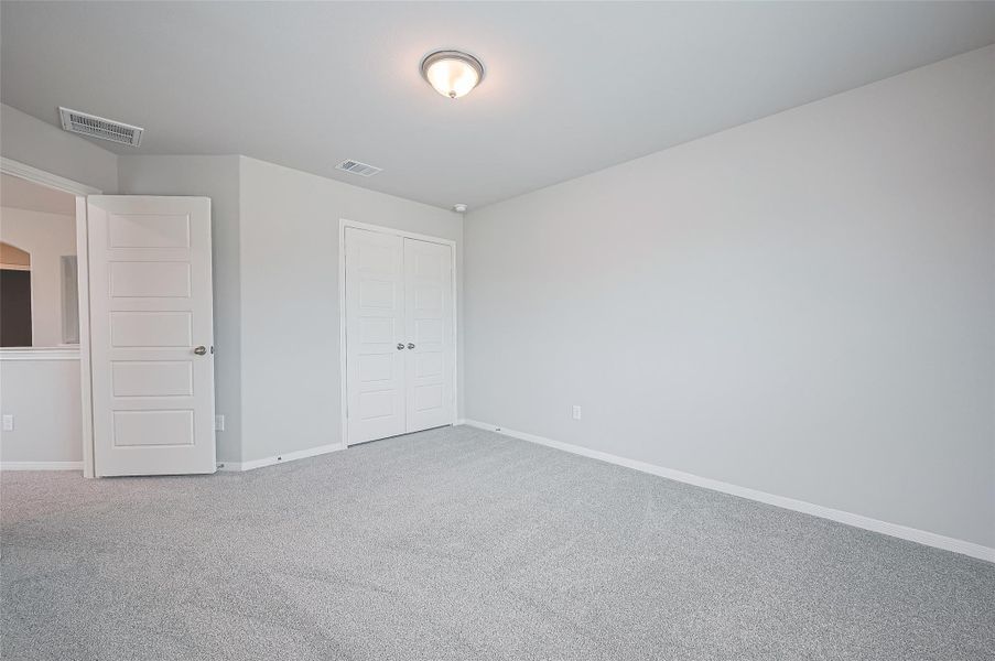 Spacious, unfurnished interior of a new home in Sunterra, Katy (Image 31).