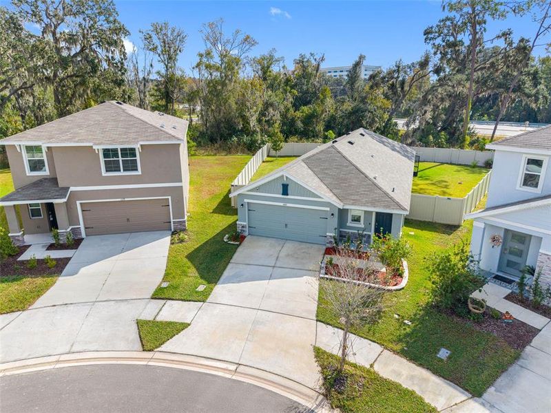 Front exterior of a new home in North Park Isle, Plant City, FL, highlighting curb appeal (Image 22). Front exterior of a new home in North Park Isle, Plant City, FL, highlighting curb appeal (Image 22).
