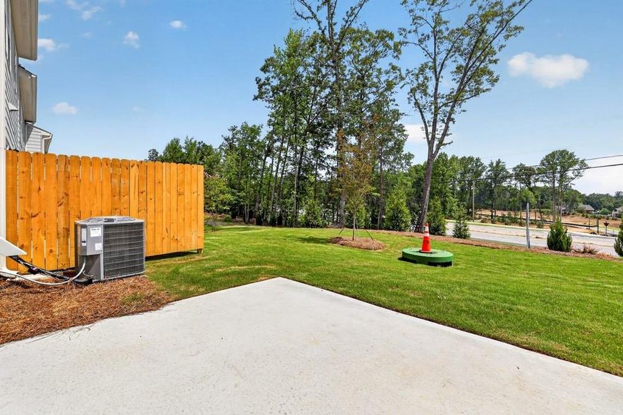 Exterior details and patio area of a home in Weatherfield, Buford (Image 4).
