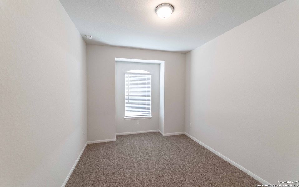 Spacious, unfurnished interior of a new home in Hennersby Hollow, San Antonio (Image 17).