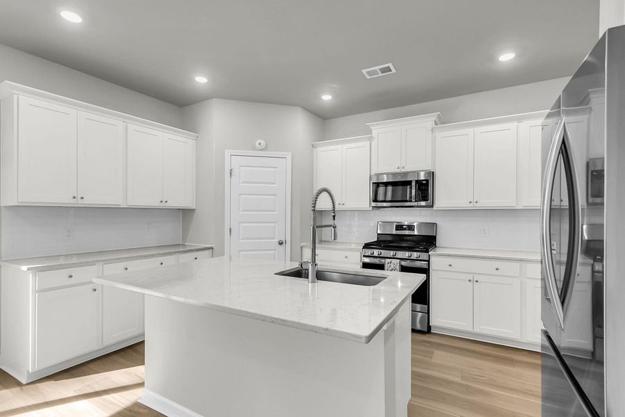 Furnished interior view inside a new home in Limehouse Village: Arbor Series, Summerville (Image 13).