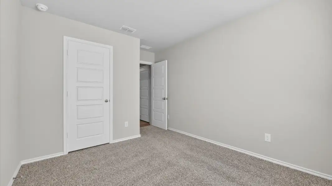 Spacious, unfurnished interior of a new home in Monarch at the Meadows, Ponder (Image 22).