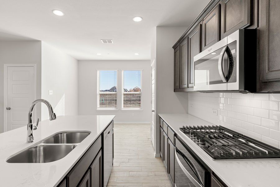 Representative exterior photo of a completed home built from the Conroe by Impression Homes in Creekshaw, Royse City, TX (Image 10). Representative exterior photo of a completed home built from the Conroe by Impression Homes in Creekshaw, Royse City, TX (Image 10).