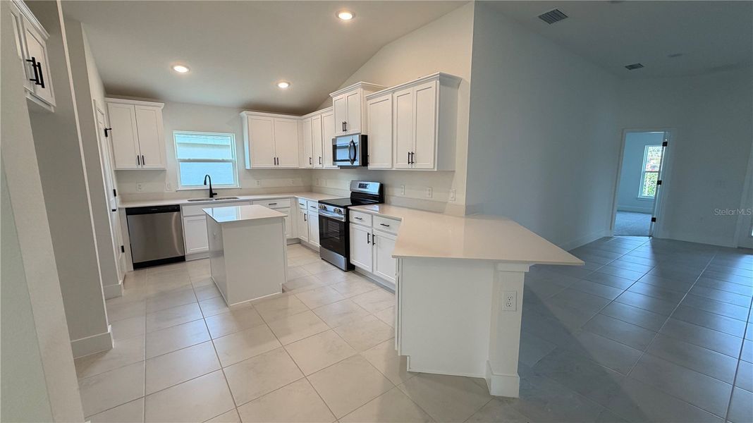 Furnished interior view inside a new home in Watercress Cove, North Port (Image 3).