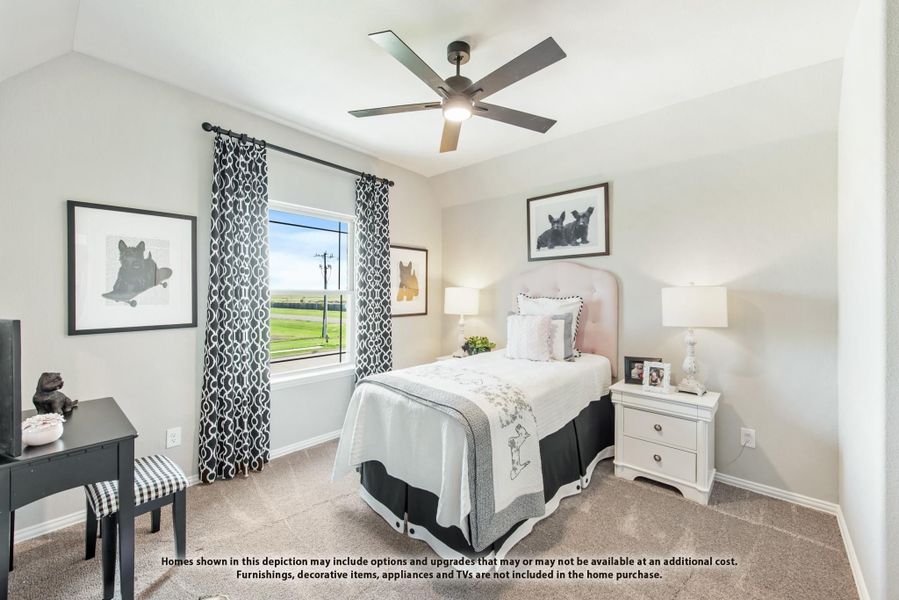 Bedroom with twin bed, ceiling fan, carpet flooring, and large window with patterned curtains Bedroom with twin bed, ceiling fan, carpet flooring, and large window with patterned curtains