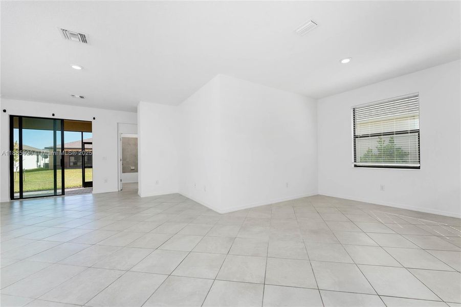Spacious, unfurnished interior of a new home in , Port Charlotte (Image 24).