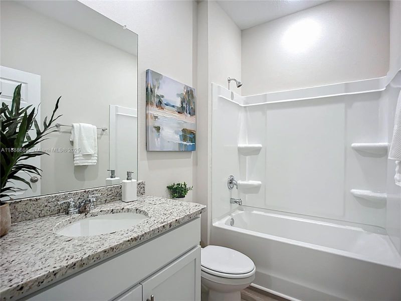 Furnished interior view inside a new home in , North Port (Image 14).