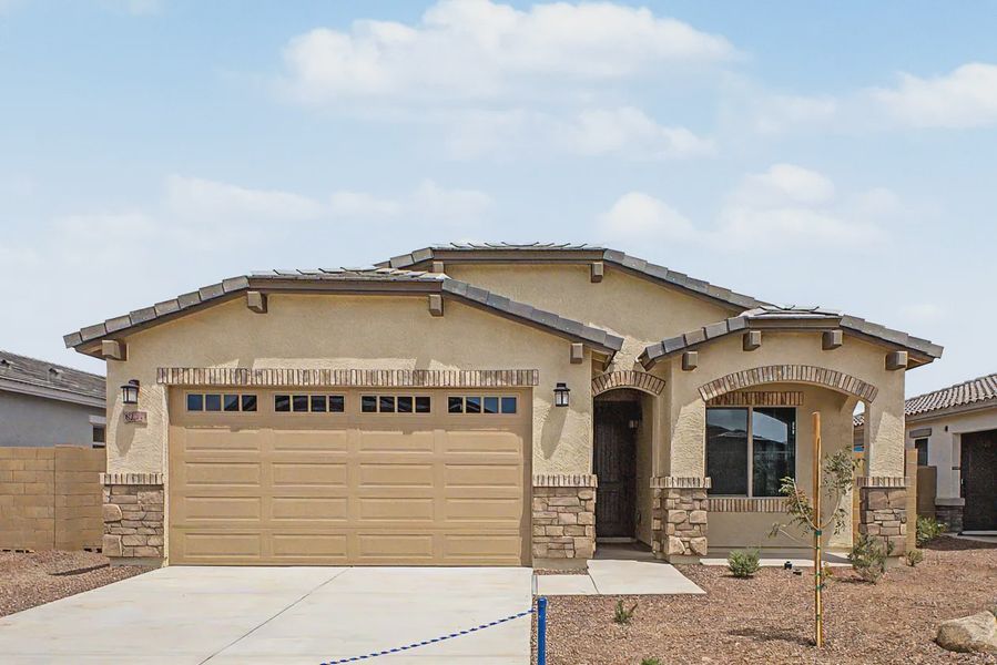 Front exterior of a new home in Avanti at Granite Vista, Waddell, AZ, highlighting curb appeal (Image 23).