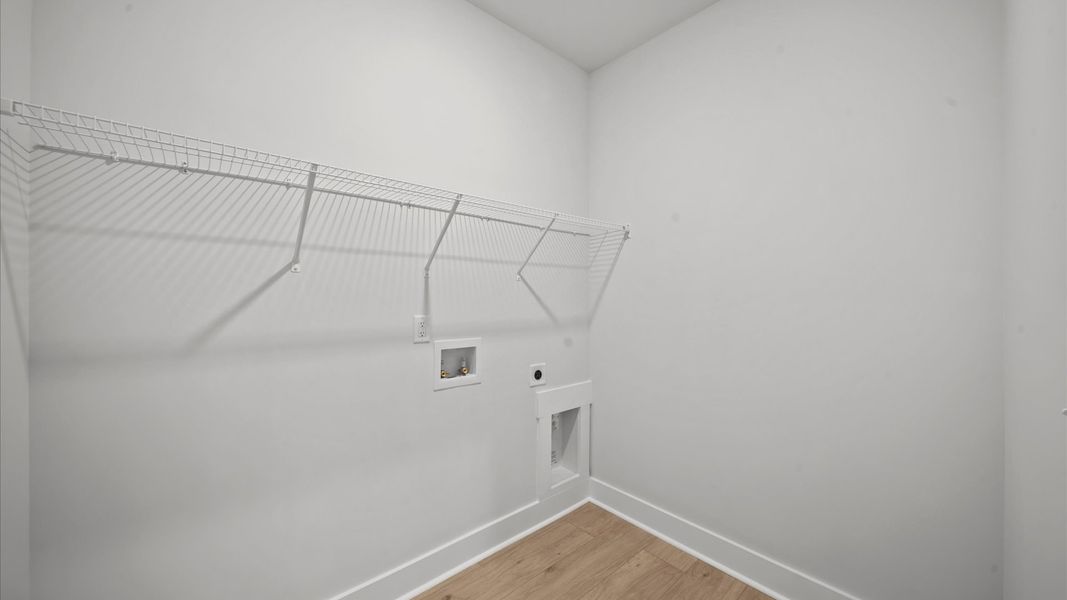 Representative furnished interior of a home built from the Kendrick - Finished Basement by DRB Homes in Pinebrook, Woodruff (Image 9).