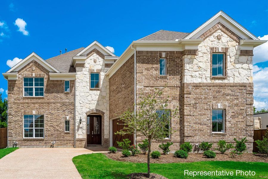 Representative exterior photo of a completed home built from the Downton Abbey by Grand Homes in Monterra, Fate, TX (Image 19). Representative exterior photo of a completed home built from the Downton Abbey by Grand Homes in Monterra, Fate, TX (Image 19).