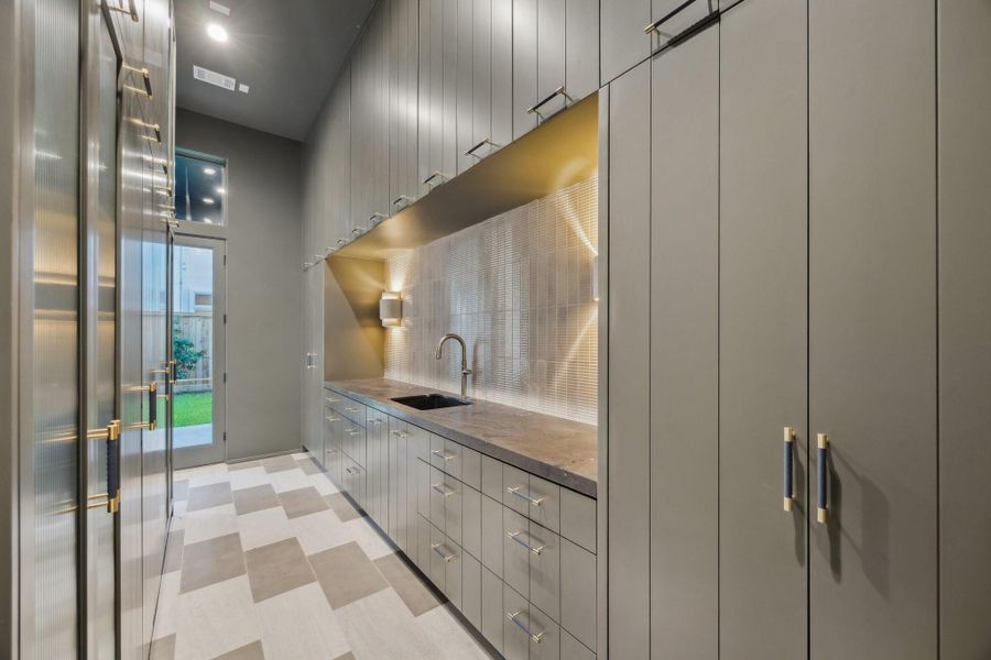 Another view of the Scullery which also offers a 18" deep Pantry with Reeded Glass Door. Another view of the Scullery which also offers a 18" deep Pantry with Reeded Glass Door.