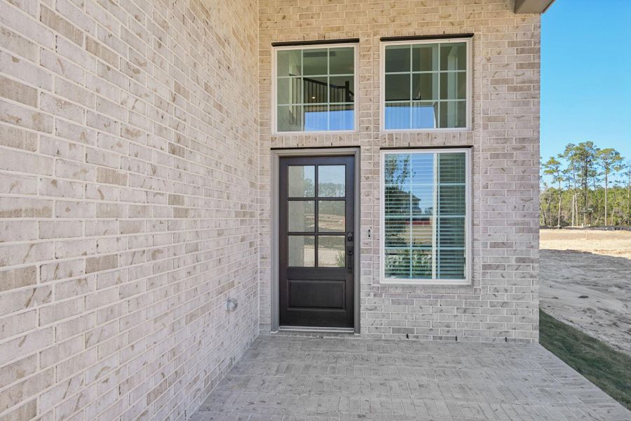 Exterior details and patio area of a home in Evergreen, Conroe (Image 15).