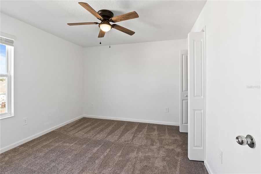 Spacious, unfurnished interior of a new home in Storey Creek: Manor Collection, Kissimmee (Image 30).