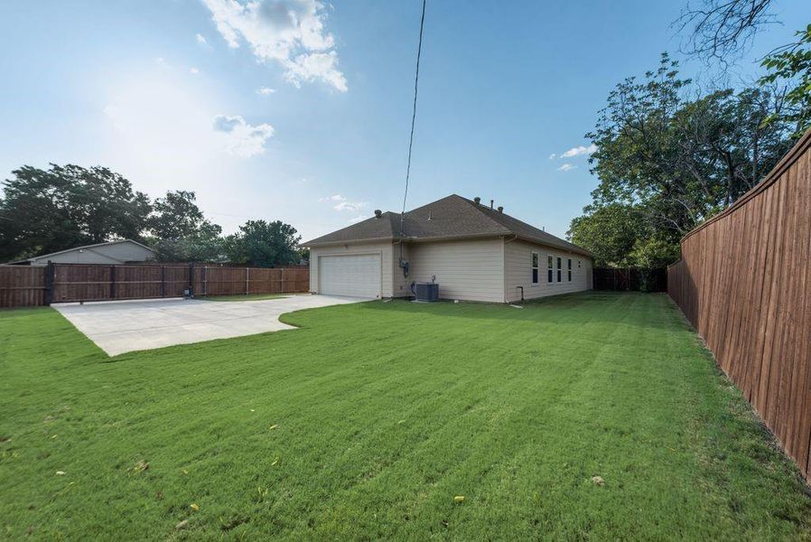 View of yard featuring a patio and central air condition unit