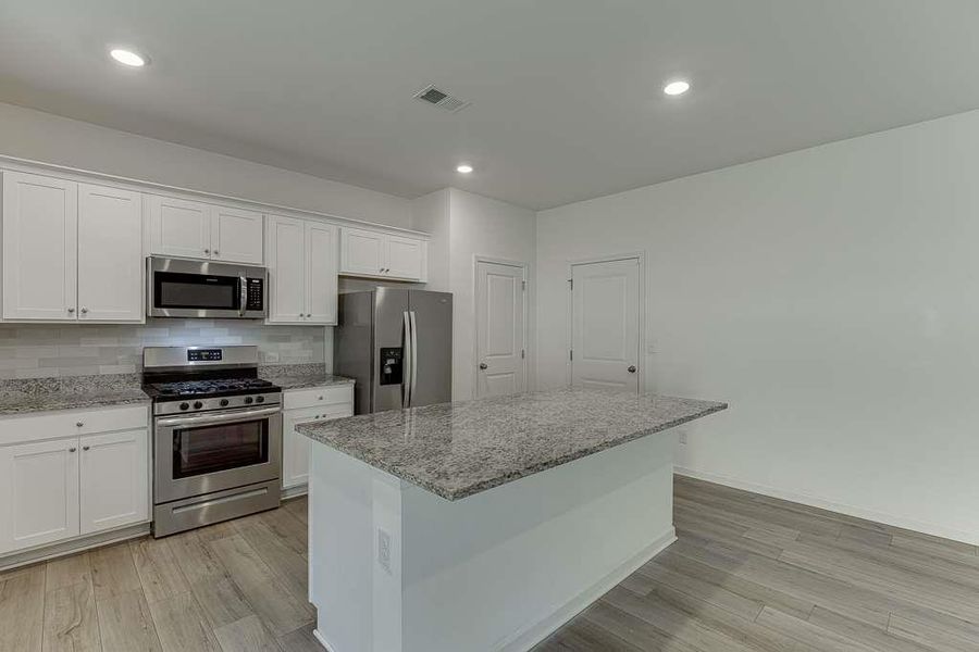 Furnished interior view inside a new home in , Loganville (Image 5). Furnished interior view inside a new home in , Loganville (Image 5).