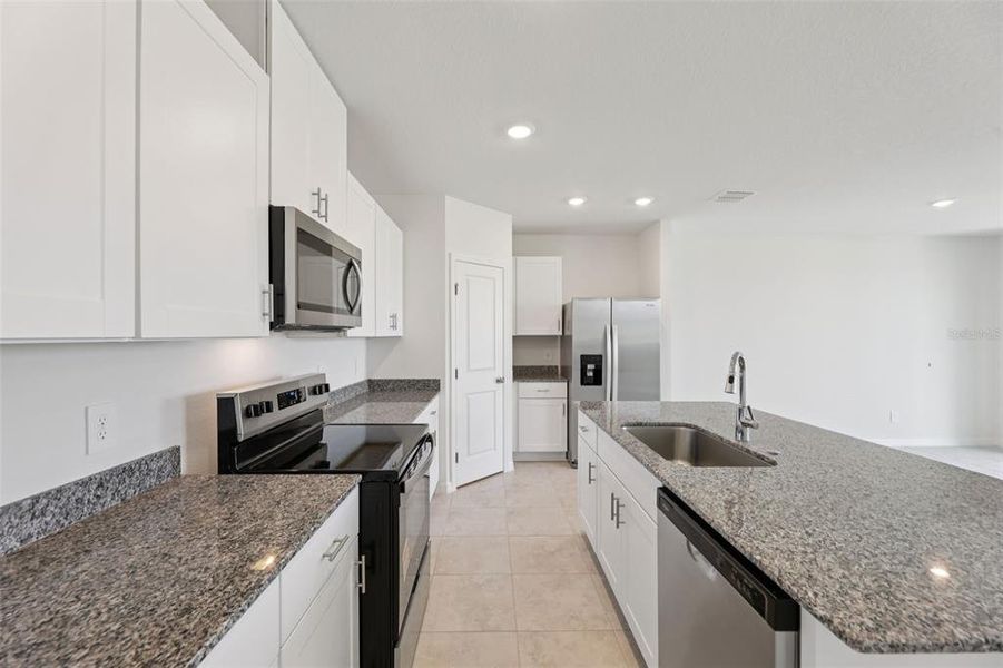 Furnished interior view inside a new home in Crosswinds - Signature Series, Haines City (Image 5).