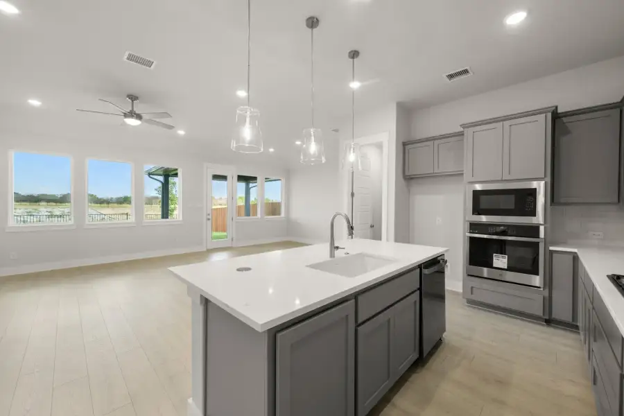 Representative furnished interior of a home built from the Liberty by Rockwell Homes in Wildflower Ranch, Justin (Image 10).
