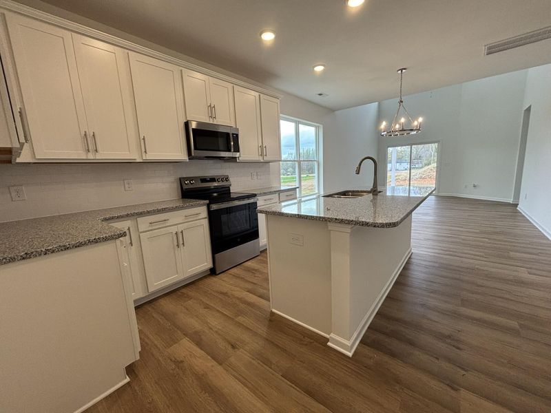 Furnished interior view inside a new home in CraigStone, Woodruff (Image 5).