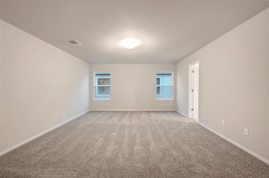 Spacious, unfurnished interior of a new home in Carillon, Manor (Image 8).
