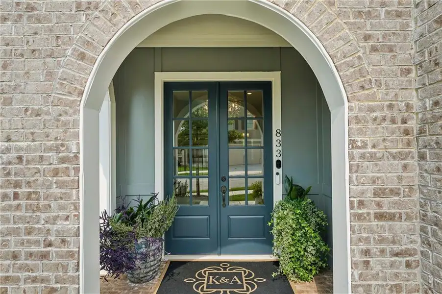 Exterior details and patio area of a home in Lakeside at River Green, Canton (Image 31).