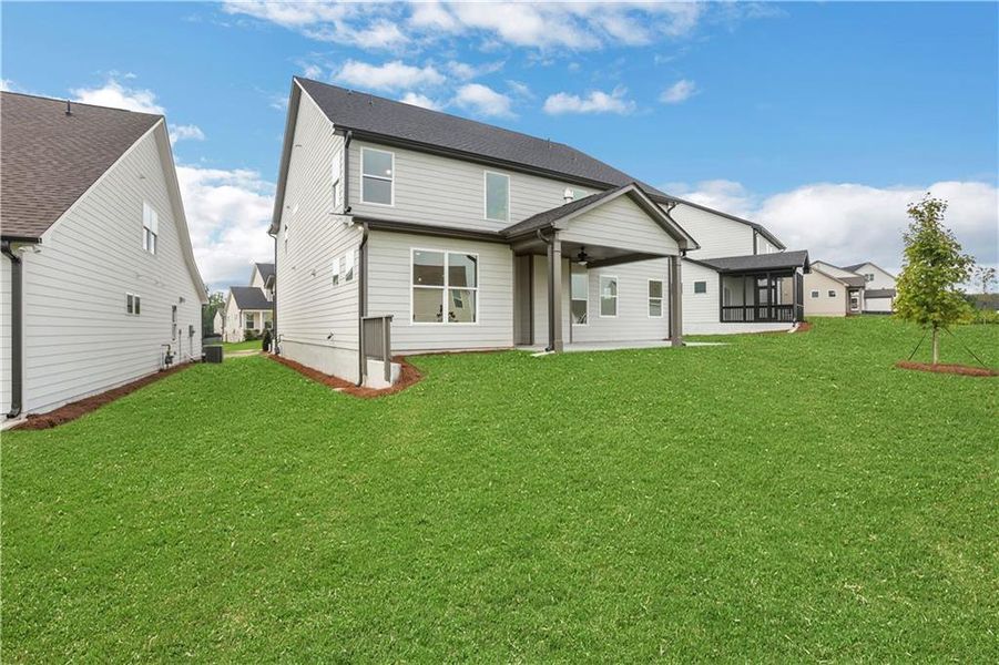 Exterior details and patio area of a home in Twin Lakes, Hoschton (Image 33).
