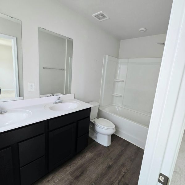 Furnished interior view inside a new home in , Greenville (Image 4).