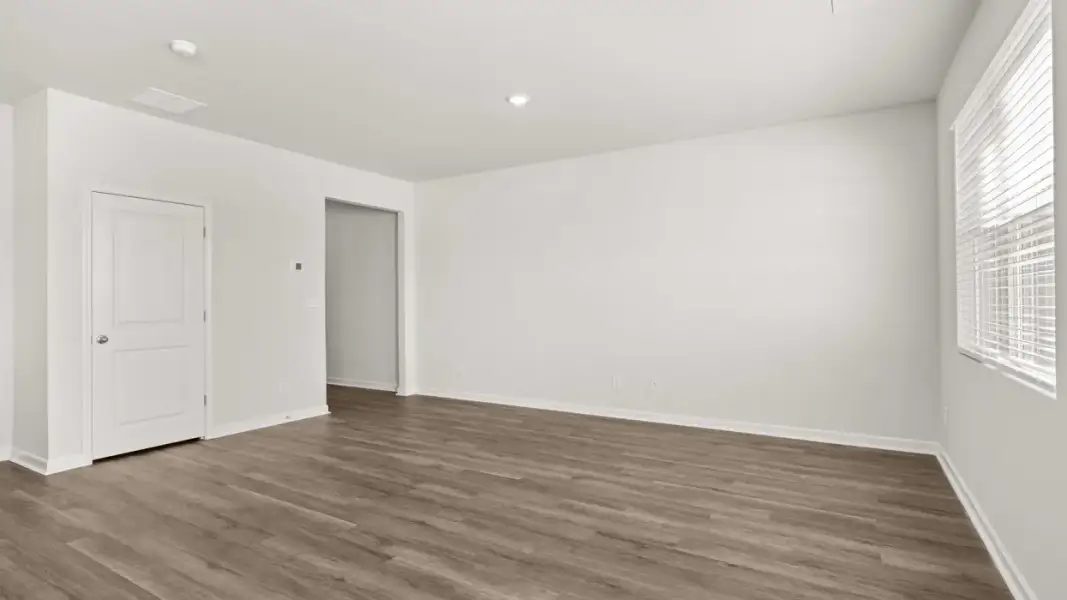 Representative unfurnished interior of a home built from the Pattison by D.R. Horton in Branford Crossing, Stockbridge (Image 8).