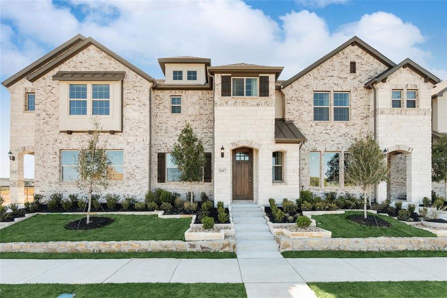 View of front of home featuring a front yard