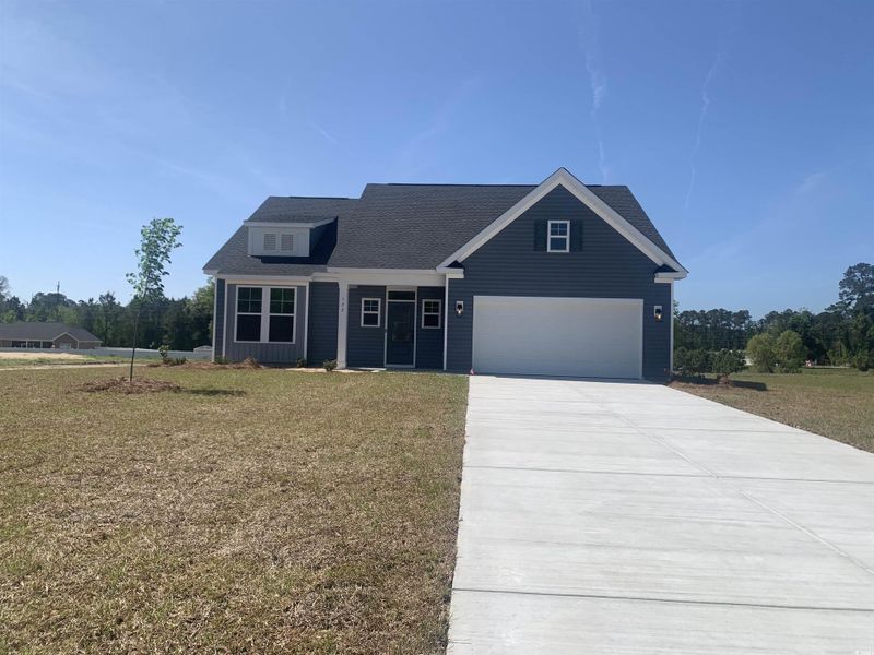 Front exterior of a new home in Oak Grove, Conway, SC, highlighting curb appeal (Image 1). Front exterior of a new home in Oak Grove, Conway, SC, highlighting curb appeal (Image 1).