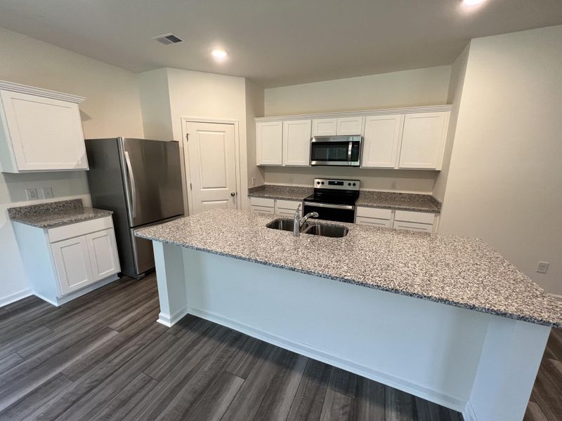 Furnished interior view inside a new home in Pender Woods at Cane Bay, Summerville (Image 4). Furnished interior view inside a new home in Pender Woods at Cane Bay, Summerville (Image 4).