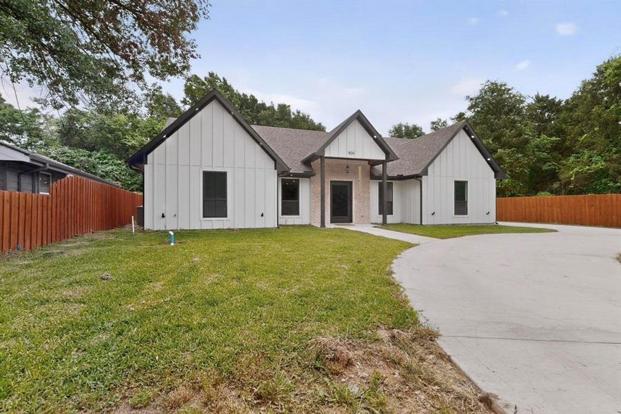 Front exterior of a new home in , Tool, TX, highlighting curb appeal (Image 24).