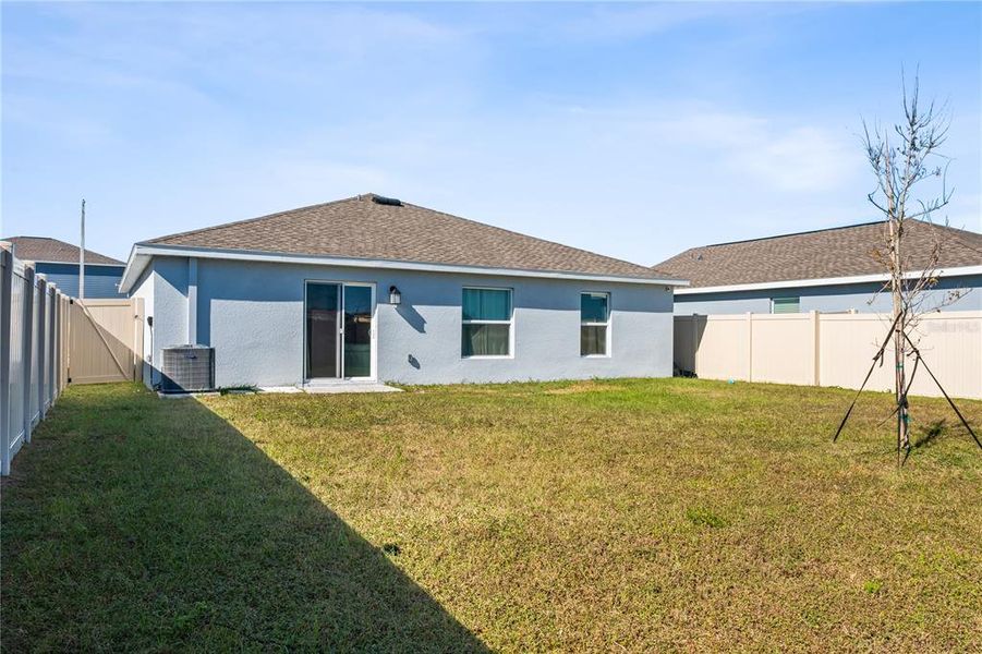 Exterior details and patio area of a home in Peace Creek Reserve: Grand Collection, Winter Haven (Image 1).