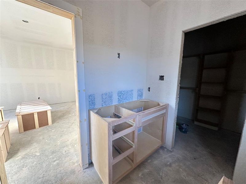 Bathroom with concrete flooring