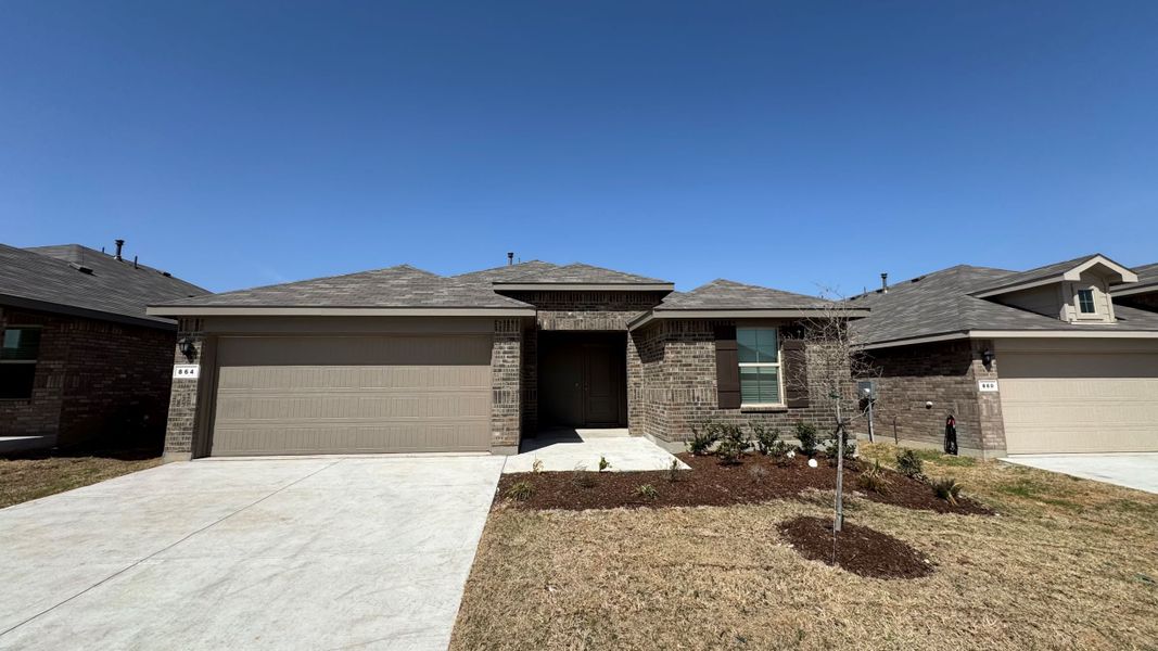 Representative exterior photo of a completed home built from the denton by D.R. Horton in Hickory Grove, Krum, TX (Image 2). Representative exterior photo of a completed home built from the denton by D.R. Horton in Hickory Grove, Krum, TX (Image 2).