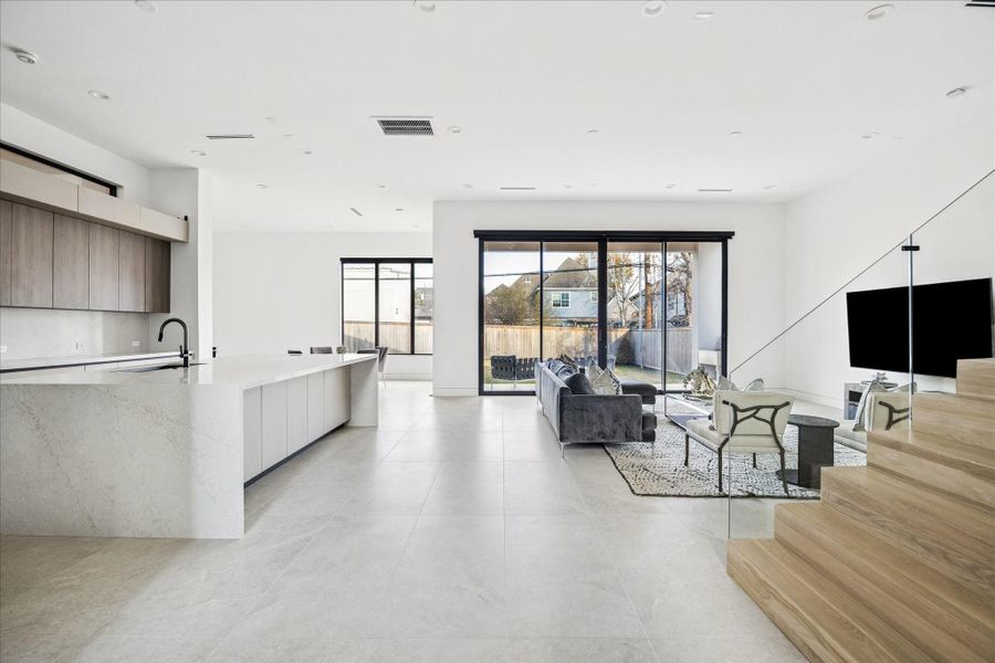 The sleek stone floors are imported from Arizona.