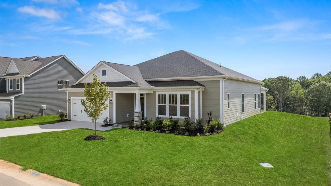 Front exterior of a new home in Pinebrook, Woodruff, SC, highlighting curb appeal (Image 20).